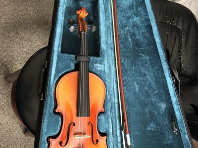 new 4/4 beginner violin never used.