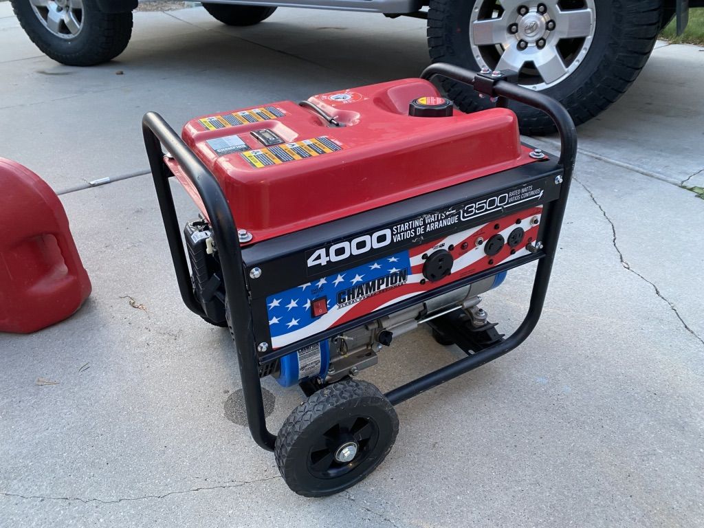Champion 4,000 watt generator, Nearly New w/ wheel