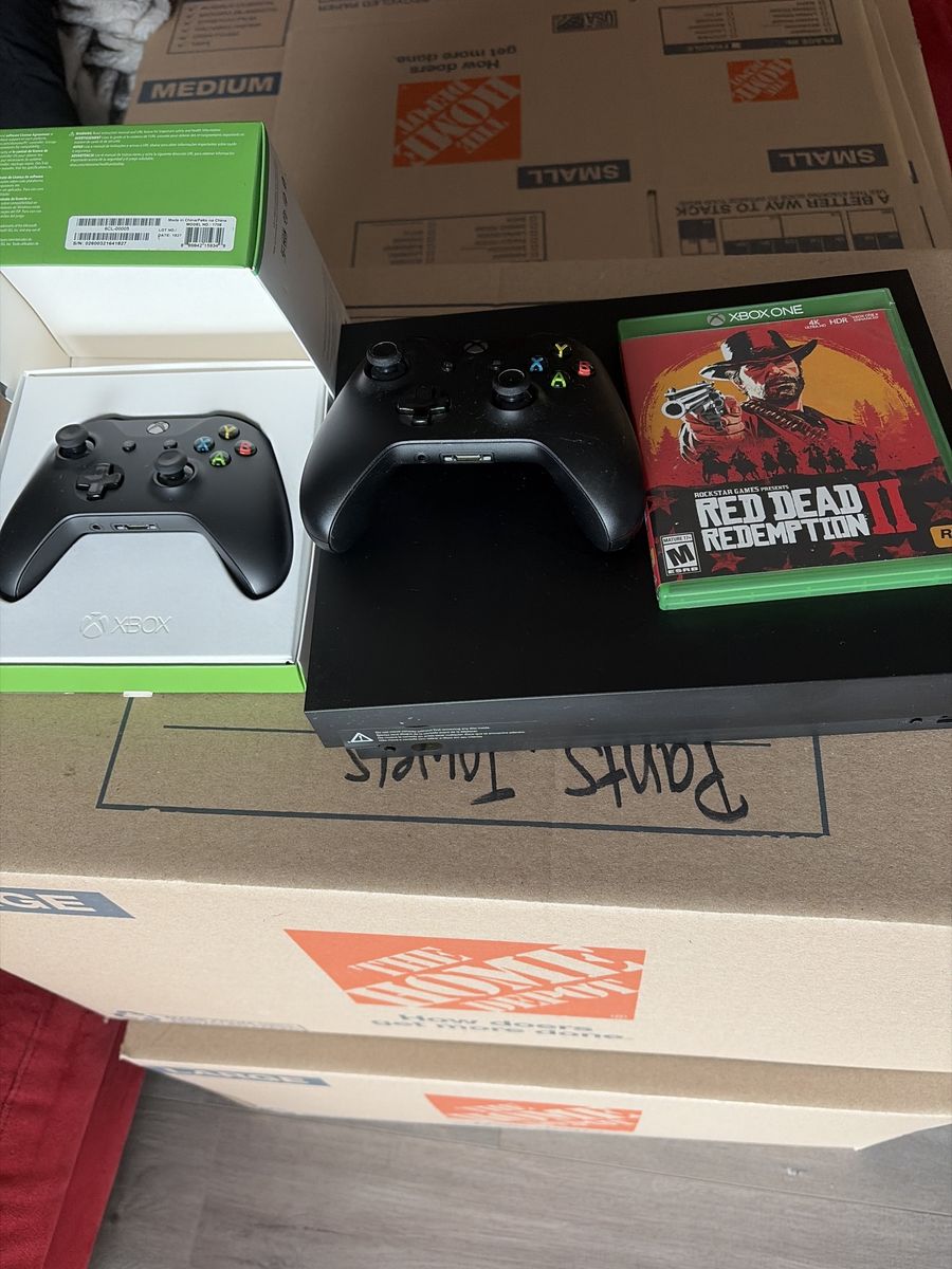 Xbox One X, 1TB with Red Dead Redemption 2 & 2 Controllers