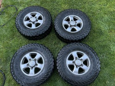 285/75/16 (33 Inch) Yokohama Geolandar G003 M/T tires and Toyota LC Wheels