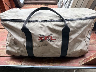 XFL Warm up cape and gear bag.