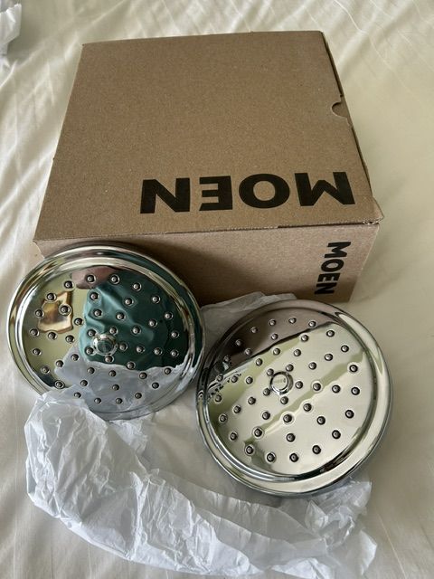 Brand new - Moen rainshower chrome showerheads.  Qty 2