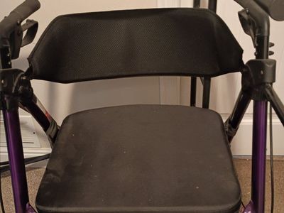 Used Purple Walker with Seat, Brakes, and Storage Bag - Mobility Aid