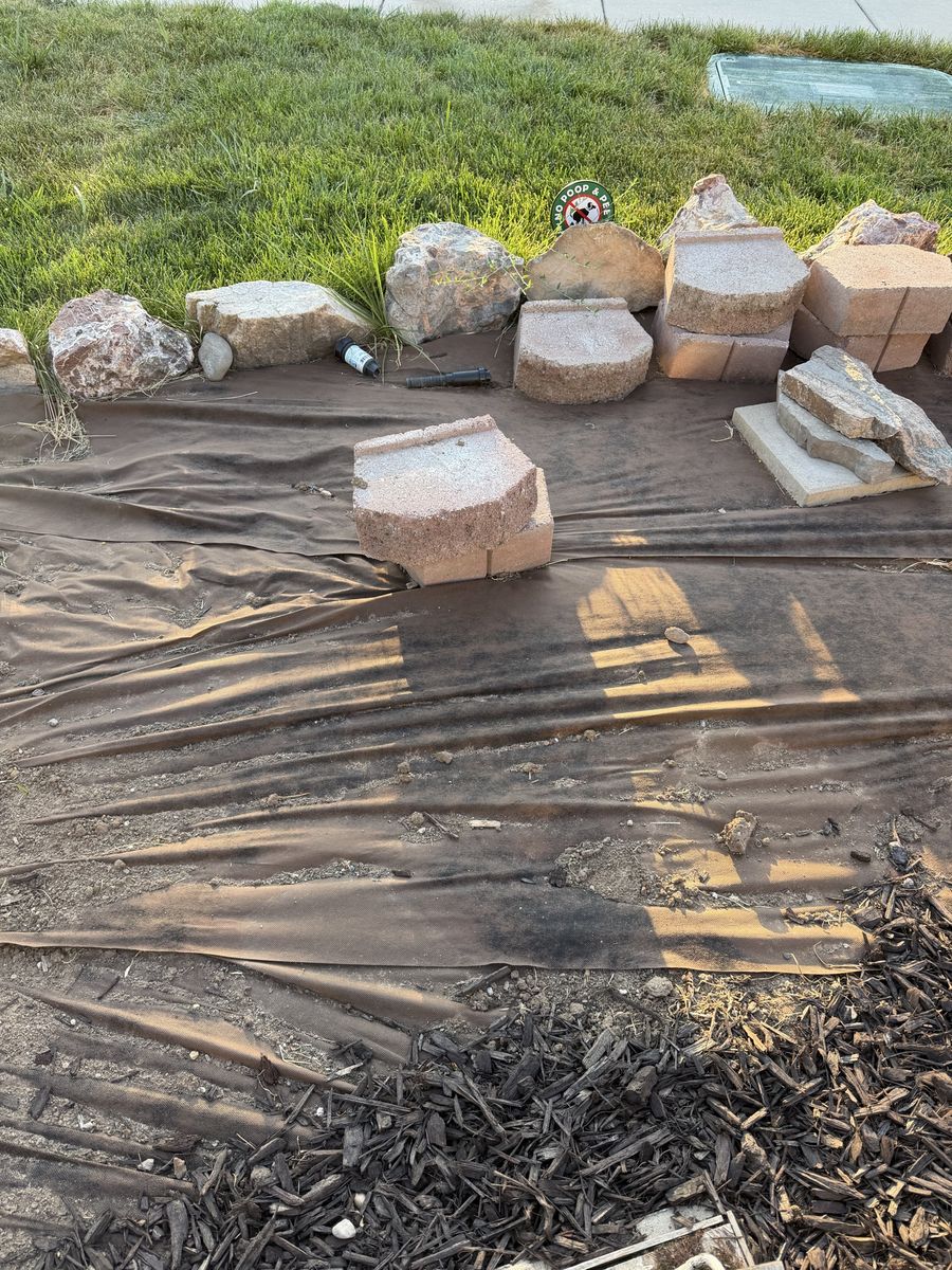 Assorted Concrete Retaining Wall Blocks and Landscape Rocksb
