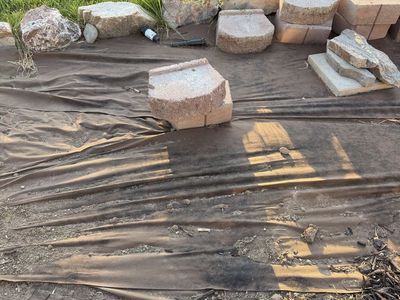 Assorted Concrete Retaining Wall Blocks and Landscape Rocksb