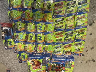 Hot wheels skate 40 + plus boards, and 2 skateparks