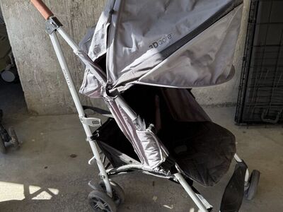 Grey And Brown Folding Stroller