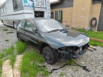 1900 Mitsubishi Mirage ES