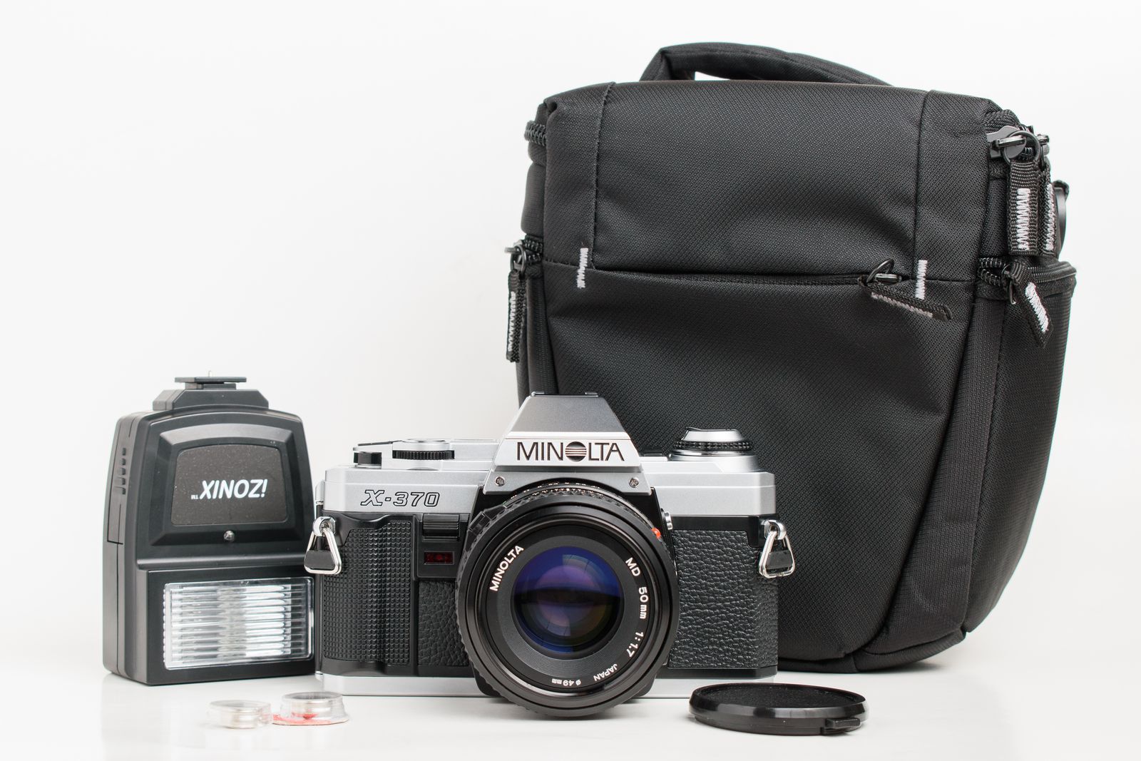 Minolta X-370 camera with 50mm lens and accessories. Tested!