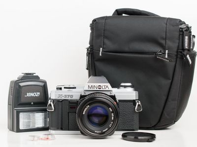Minolta X-370 camera with 50mm lens and accessories. Tested!