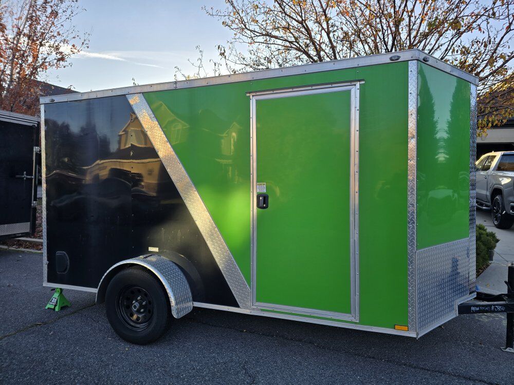 **LIKE NEW** 6x12 UPGRADED ENCLOSED TRAILER