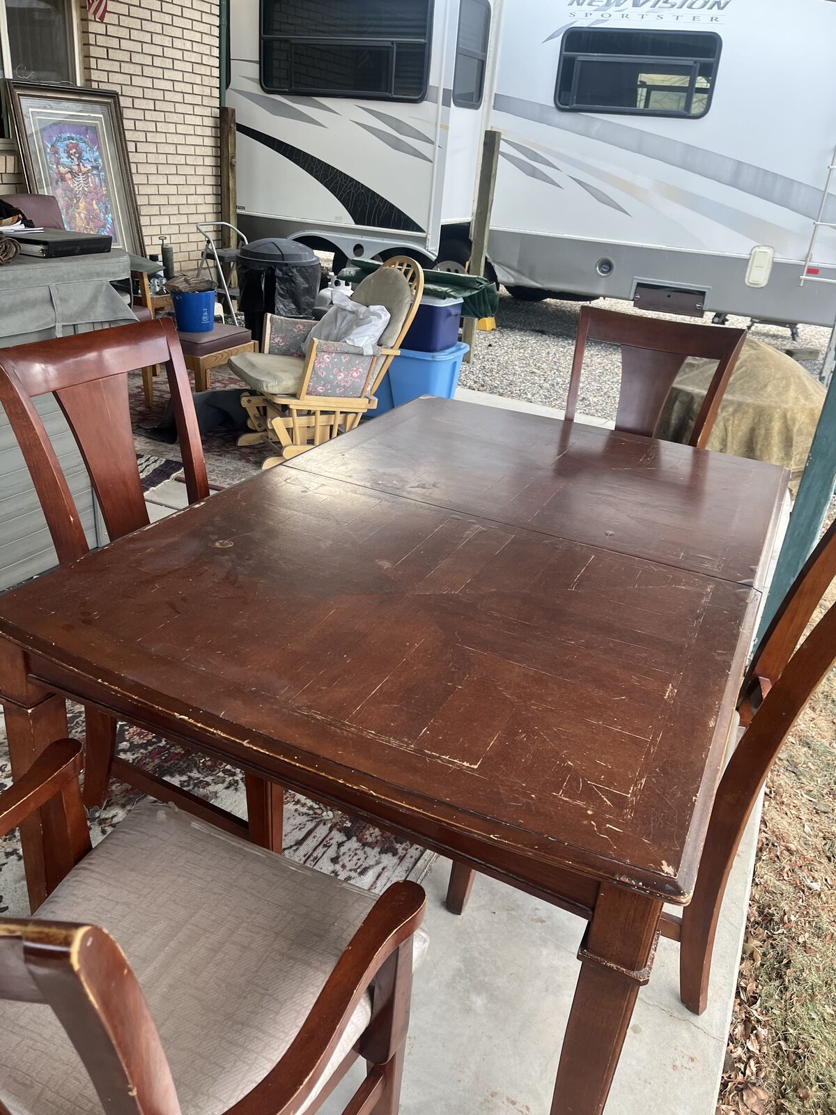 Sturdy wood dining table w/4 cushioned cha