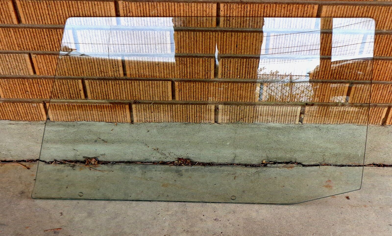 1965-1966 Chrysler Newport rear drivers side door glass panel