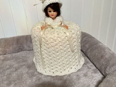 Knitted doll toilet paper holder