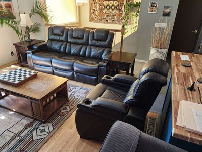 Very Nice Power Reclining Sofa, and Reclining Chair with 2 End Tables.