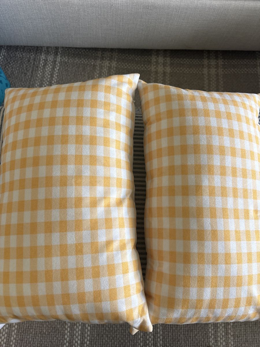 Two yellow gingham pillows