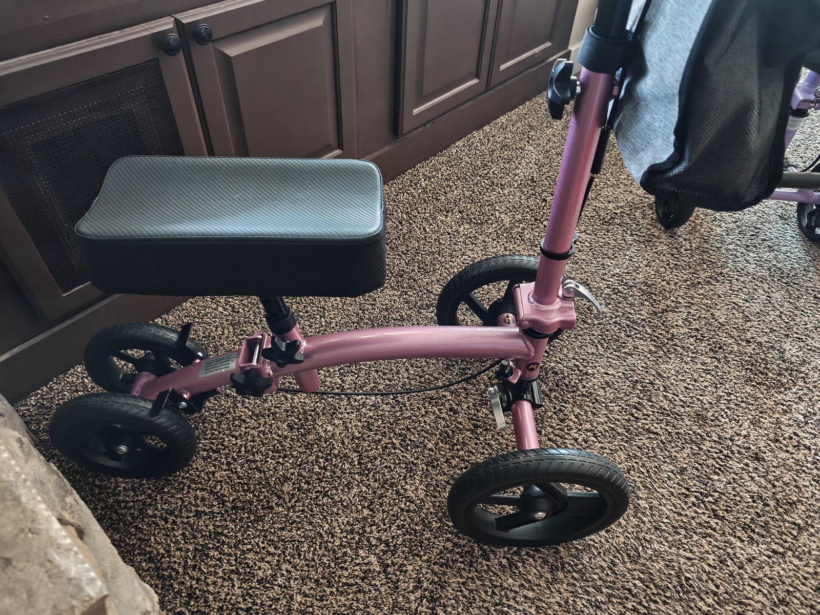 New in the box knee scooter. Metallic purple