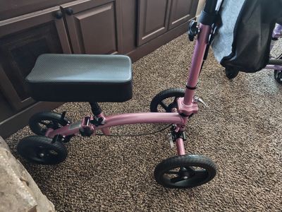 New in the box knee scooter. Metallic purple