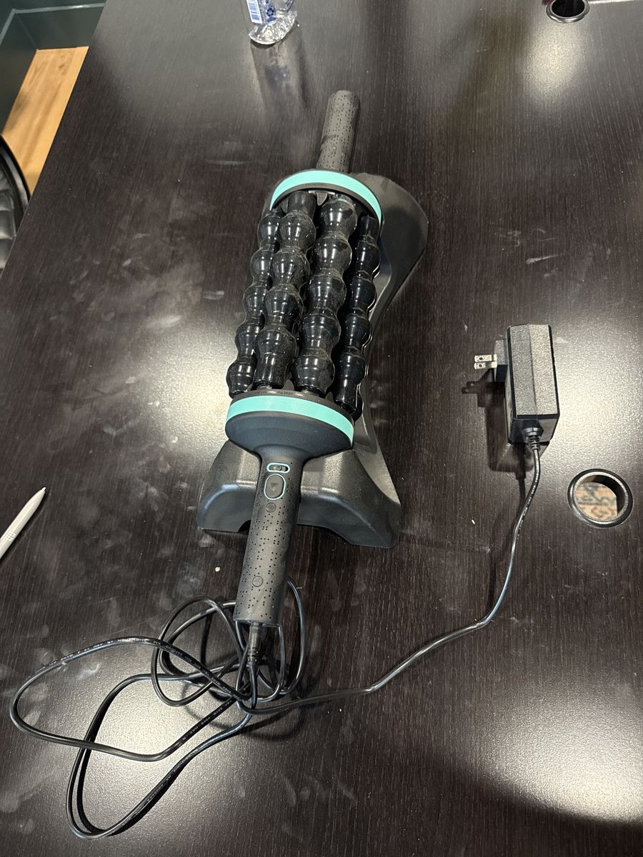 Chirp rolling percussion massager