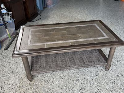 Indoor Outdoor Metal Frame Coffee Table with Faux-Wood Tile Top & Woven Shelf