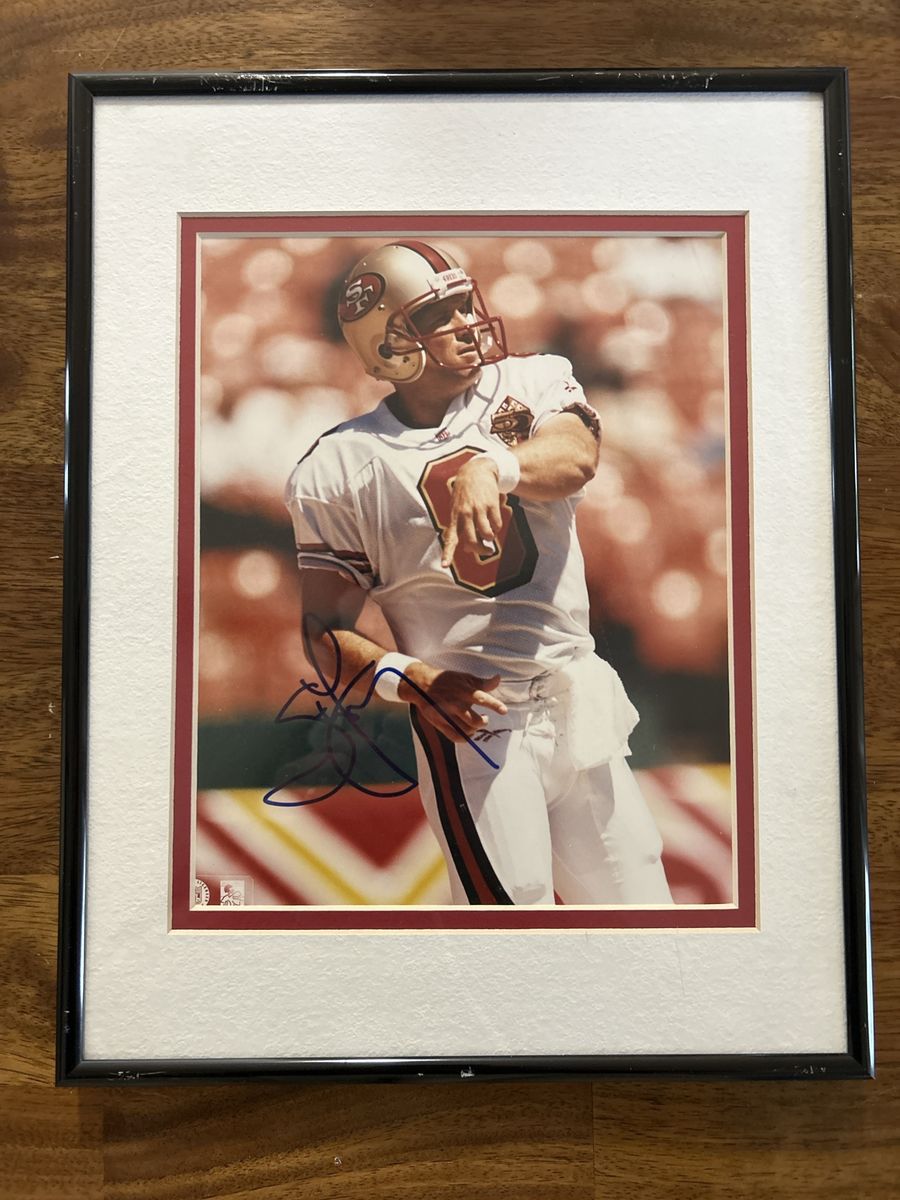 11x14 Autographed Steve Young San Francisco 49ers Framed & Double Matted NFL Hand Signed Football Photo W/COA Sticker affixed.