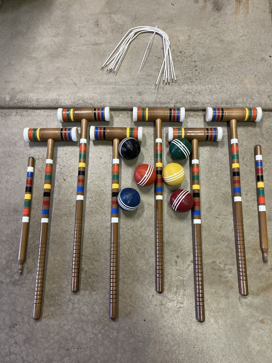 Classic, colorful wooden croquet set. 6 players. Fun for all types of gathering.