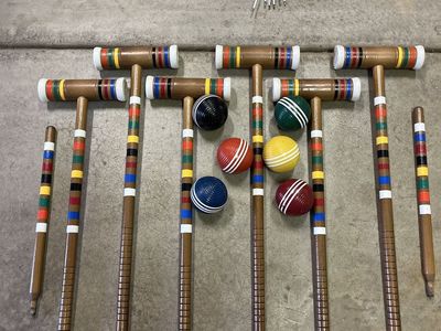 Classic, colorful wooden croquet set. 6 players. Fun for all types of gathering.