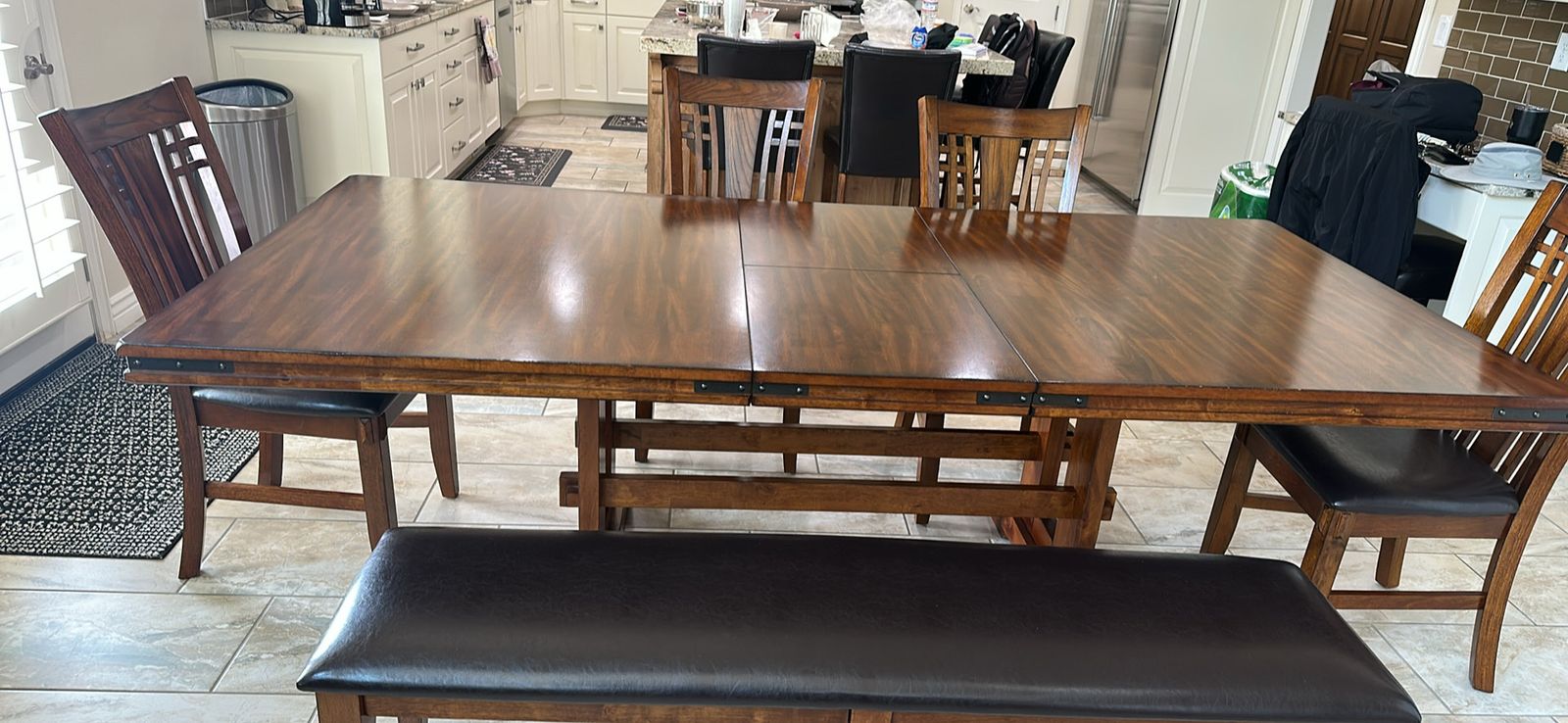Expandable Wooden Dining Table with Built-In Leaf - Rich Brown Finish