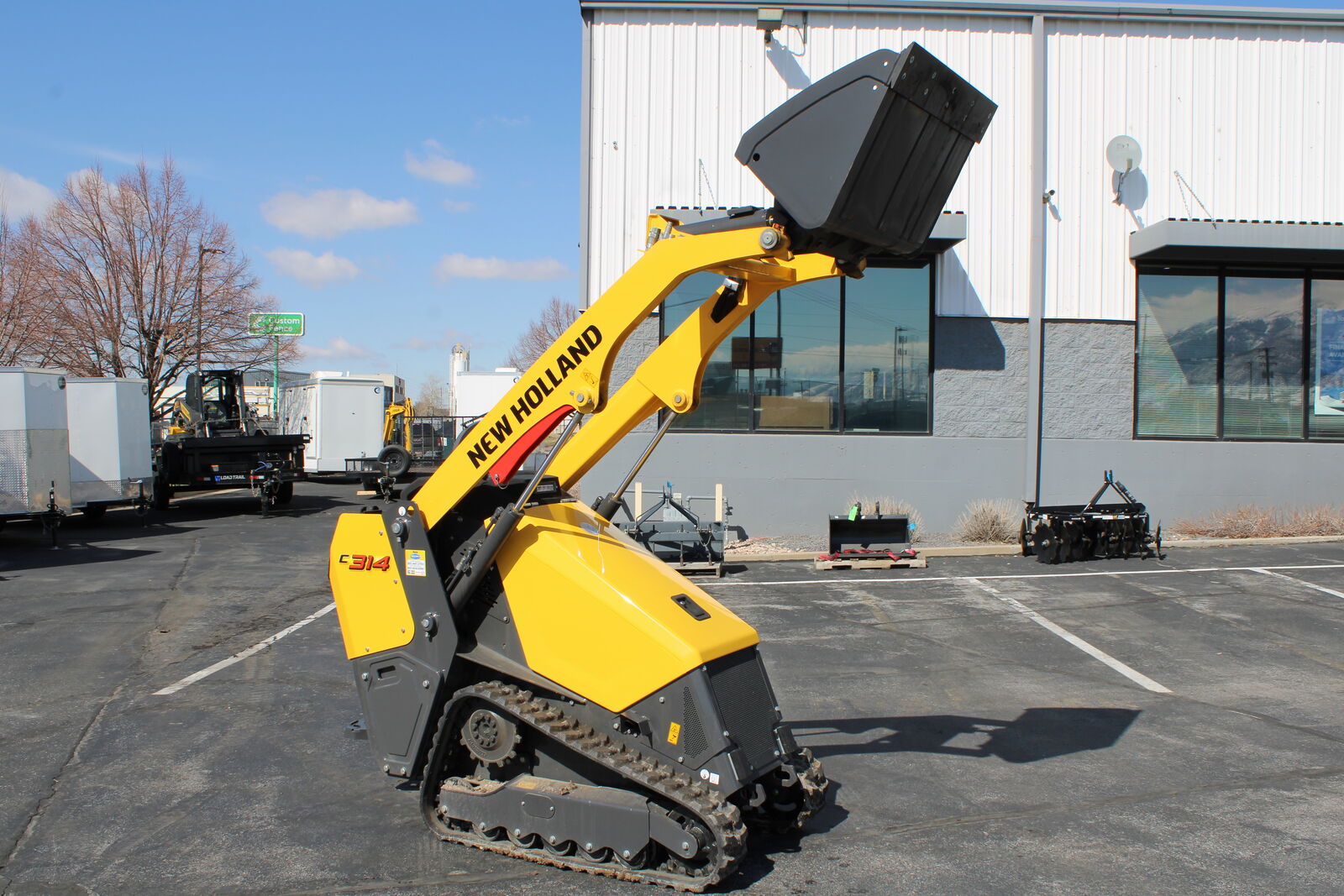 Rent the New Holland C314 Mini Track Loader – Just $99/Day!