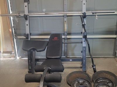 Bench and 335 pounds of weights