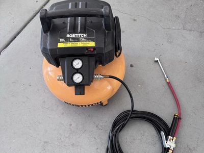 BOSTITCH 6 Gallon 150 PSI 2.6 SCFM Portable Electric Air Compressor with Hose & Nozzle