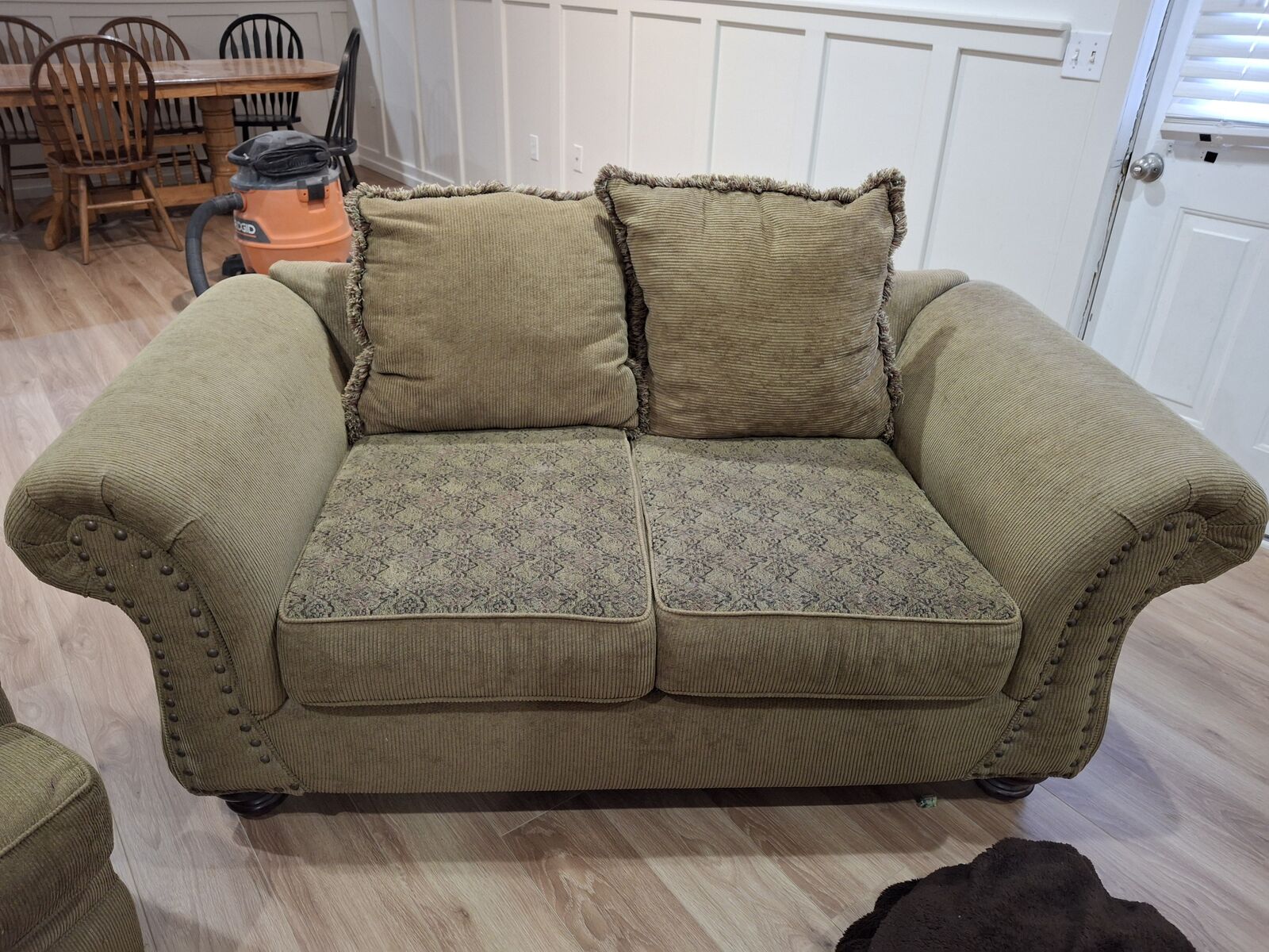 Sturdy Fabric Light Brownish Love Seat with reversable Pillows