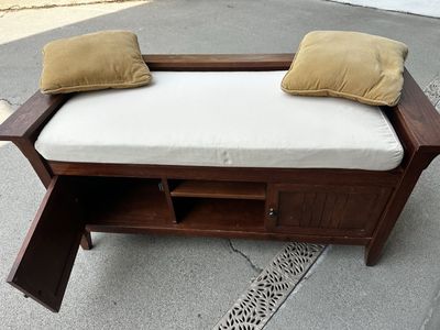 Wooden bench with storage