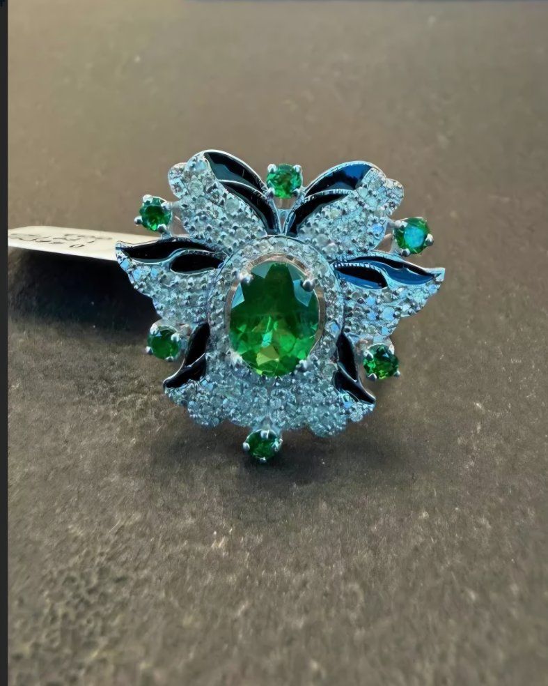 Tsavorite Garnet and Diamond floral-style ring set in 925 Sterling Silver