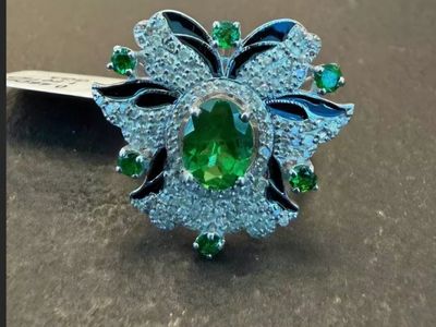 Tsavorite Garnet and Diamond floral-style ring set in 925 Sterling Silver