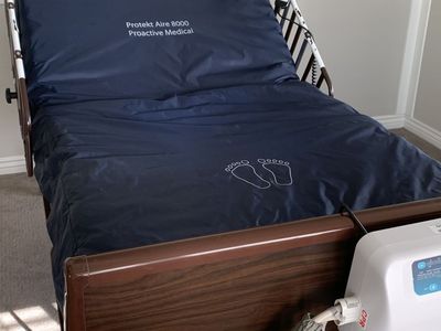 Hospital Bed w/ Air-circulating Mattress - electric adjustable; rated bariatric
