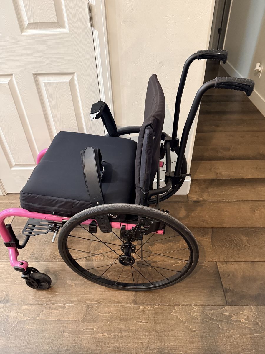 Ki Rogue 2 wheelchair with quick release wheels and safety belt