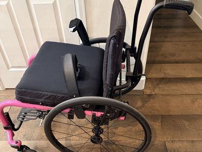 Ki Rogue 2 wheelchair with quick release wheels and safety belt