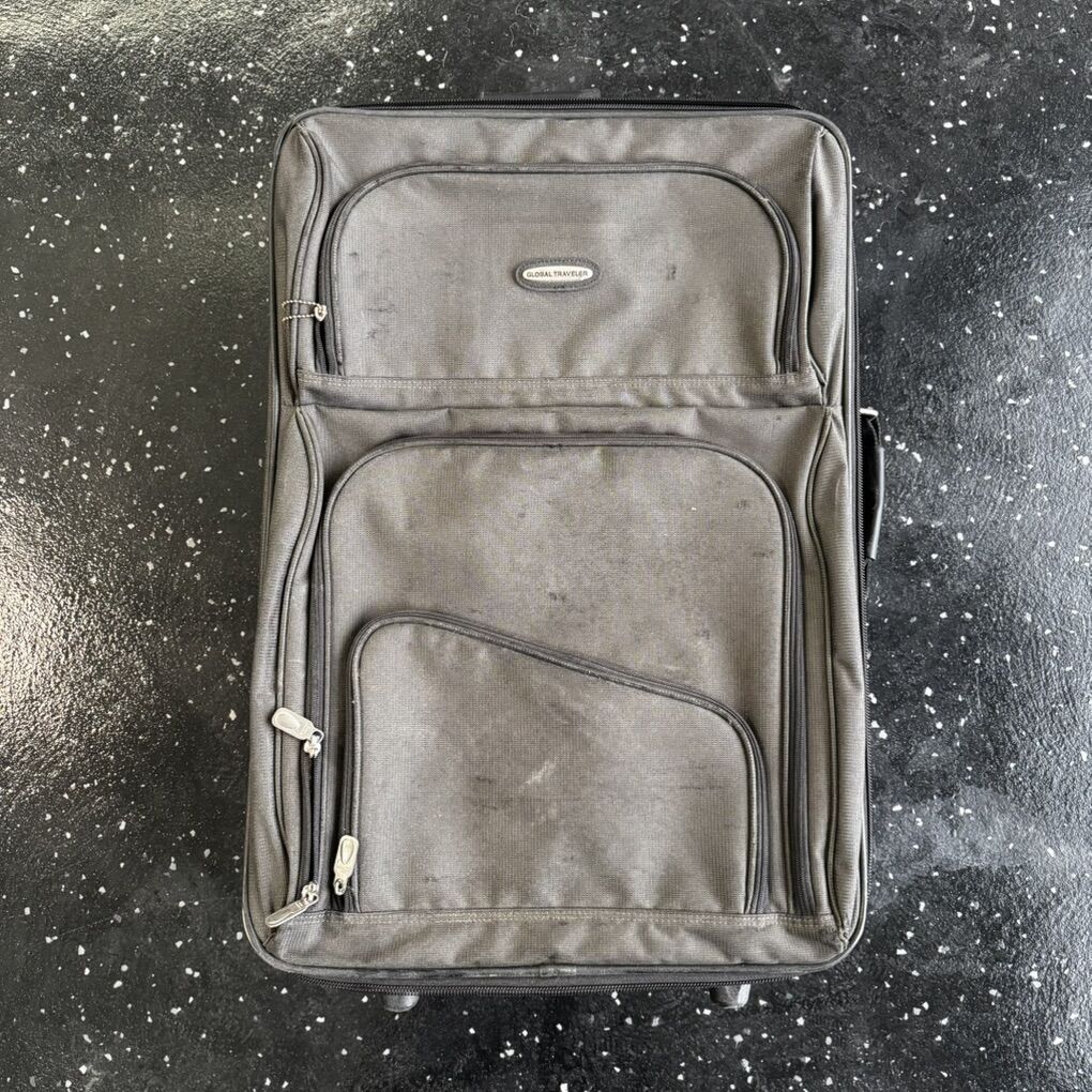 Checked Luggage Suitcase