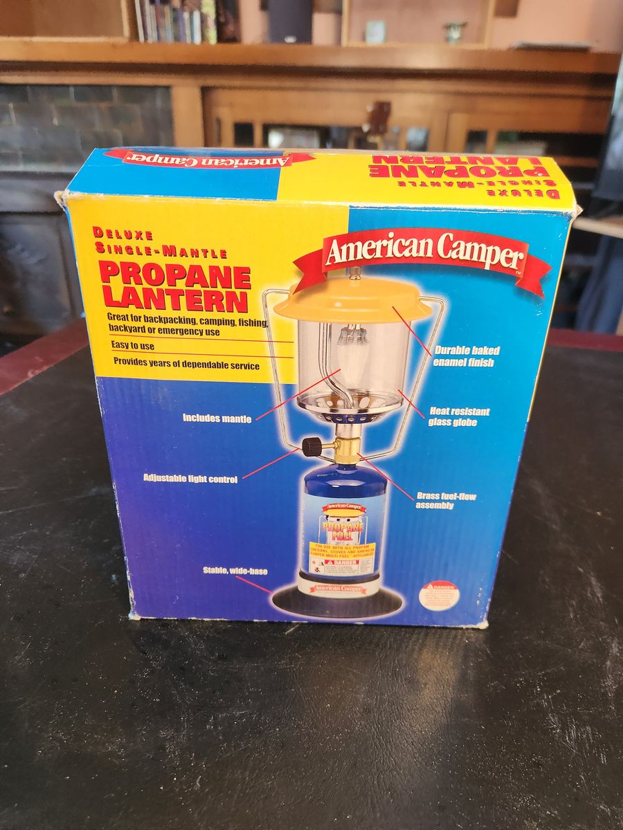 American camper single-mantle propane lantern.  Never used.  Brand new.  Mantle is intact.  All parts are there.