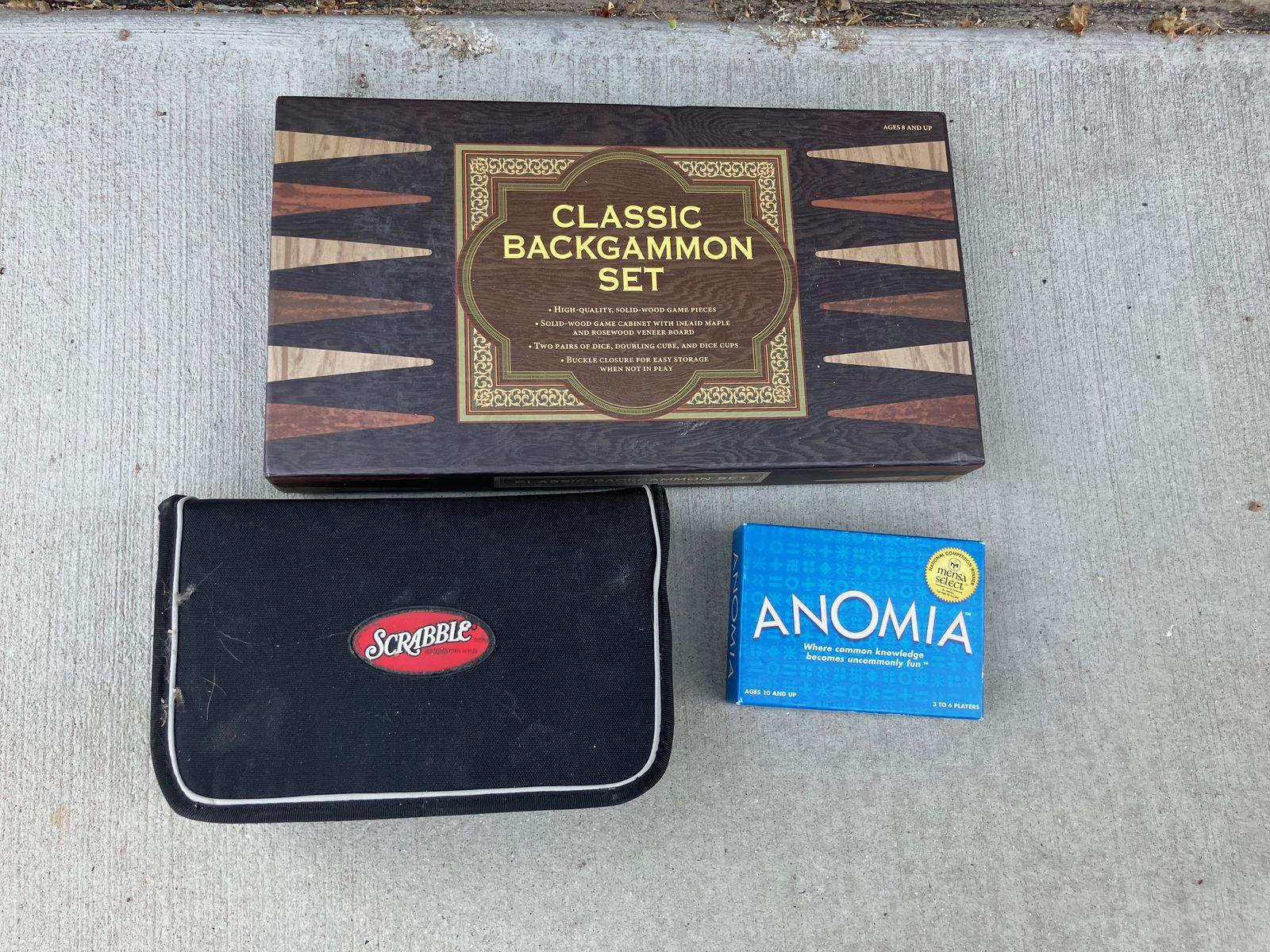 Scrabble, Backgammon, and Anomia Board Games