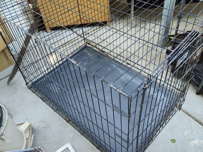 Used dog crate for sale.