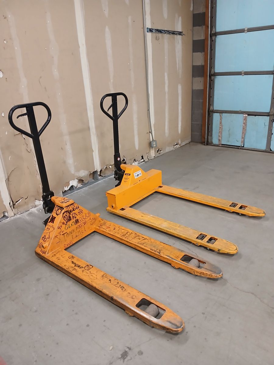 2 Heavy-Duty Manual Pallet Jacks – Good Working Condition