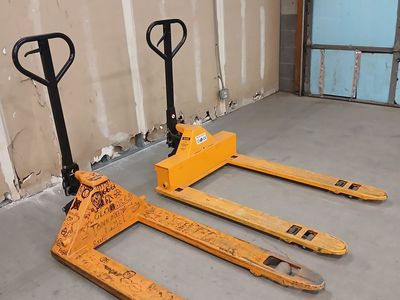 2 Heavy-Duty Manual Pallet Jacks – Good Working Condition