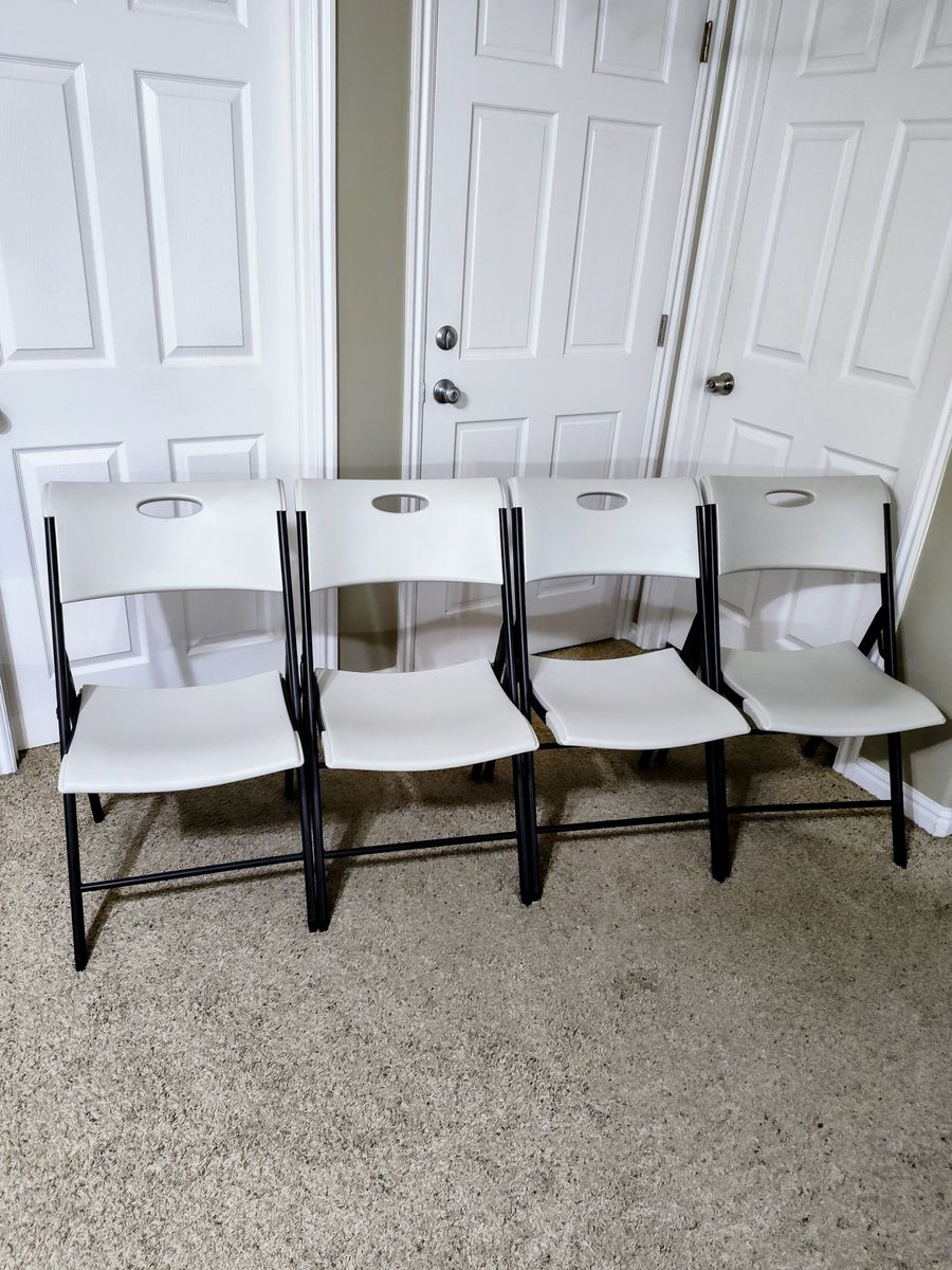 A set of 4 Lifetime folding chairs
