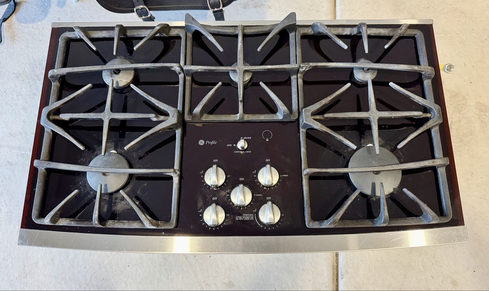 GE Profile 36" Built-In Gas Cooktop - Black Glass with Stainless Trim (JGP970SEK2SS) Propane