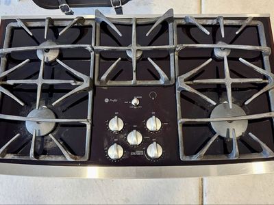 GE Profile 36" Built-In Gas Cooktop - Black Glass with Stainless Trim (JGP970SEK2SS) Propane