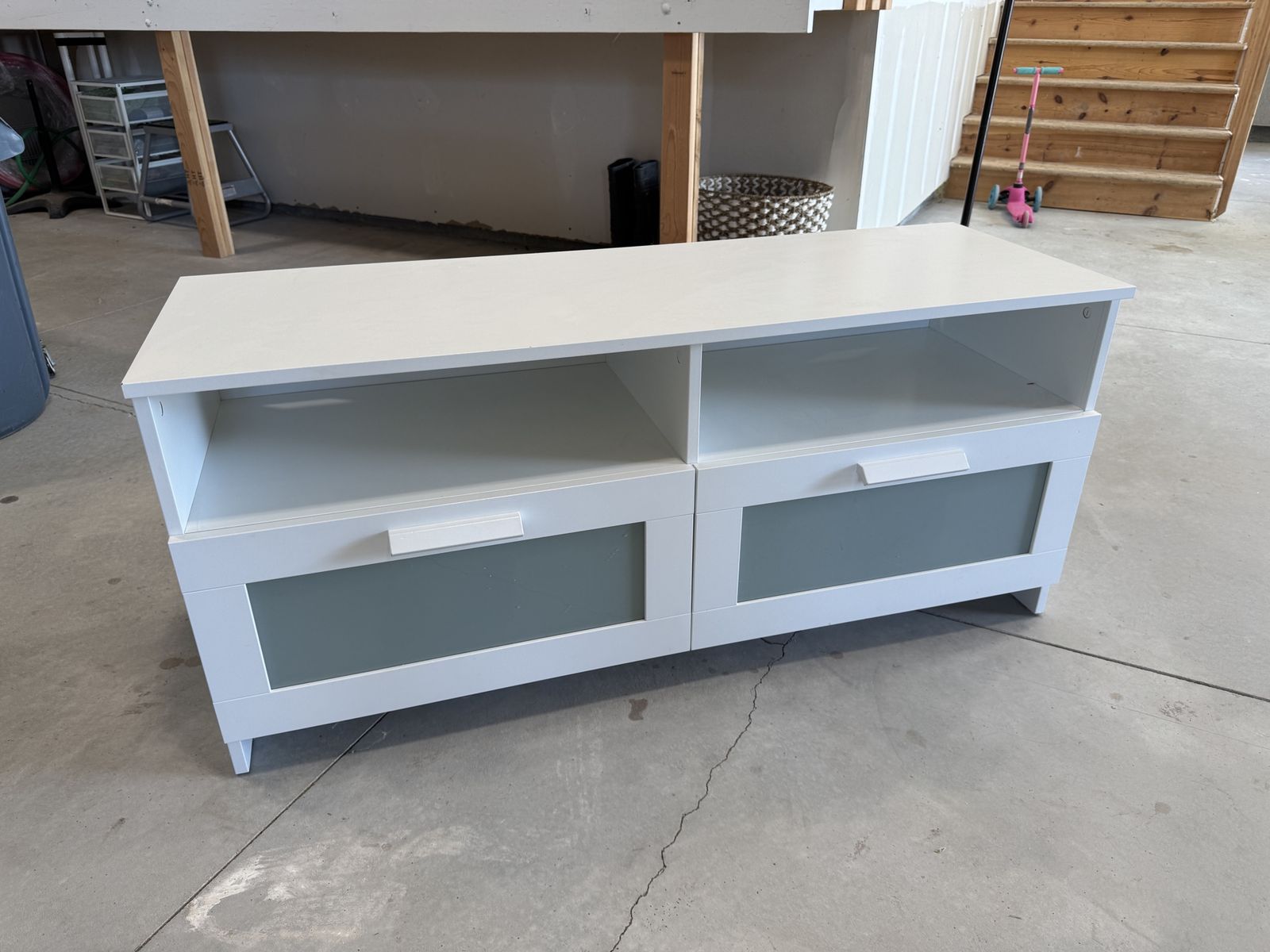 White TV stand with two storage drawers