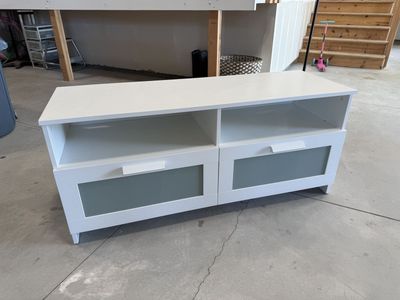 White TV stand with two storage drawers
