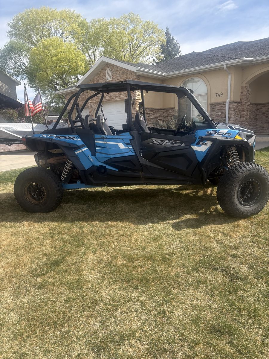 Polaris RZR XP 1000 4-Seater Side-by-Side UTV - Blue/Black, Off-Road Ready